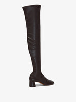 Back 3/4 image of GLOVE STRETCH OVER-THE-KNEE BOOTS in Black