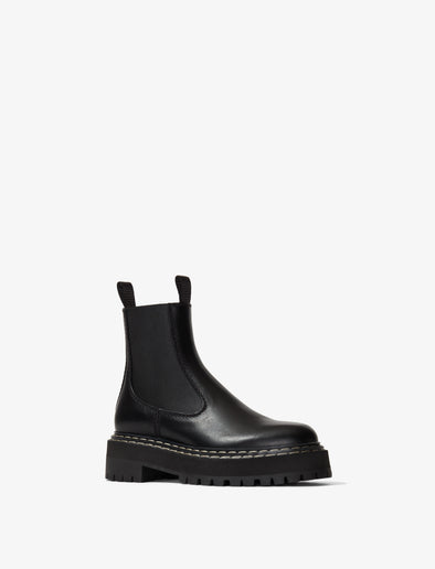 Front 3/4 view of Lug Sole Platform Chelsea Boots in black