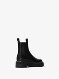 Back 3/4  view of Lug Sole Platform Chelsea Boots in black