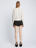 Back full length image of model wearing Textured Cotton Sweater in IVORY