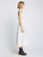 Side full length image of model wearing Viscose Linen Ruched Dress in OFF WHITE