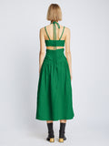 Back full length image of model wearing Viscose Linen Ruched Dress in BRIGHT GREEN