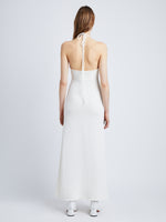 Back full length image of model wearing Textured Cotton Knit Halter Dress in IVORY