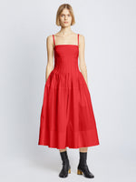 Front full length image of model wearing Poplin Pintuck Dress in RED