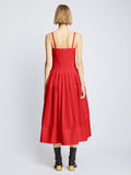 Back full length image of model wearing Poplin Pintuck Dress in RED