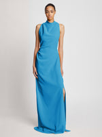 Front image of model wearing Matte Viscose Crepe Backless Dress in turquoise