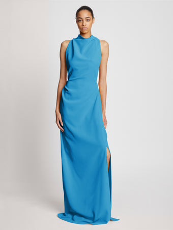 Front image of model wearing Matte Viscose Crepe Backless Dress in turquoise