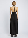 Back image of model wearing Matte Jersey Dress in black