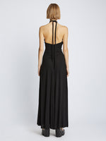 Back image of model wearing Matte Jersey Dress in black