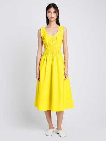 Front image of model wearing Poplin Gathered Midi Dress in sun