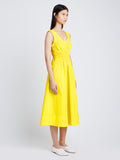 Side image of model wearing Poplin Gathered Midi Dress in sun