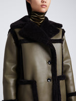 Detail image of model wearing Faux Sherpa Jacket in WOOD/BLACK