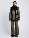 Front full length image of model wearing Faux Sherpa Jacket in WOOD/BLACK buttoned up