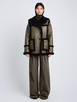 Front full length image of model wearing Faux Sherpa Jacket in WOOD/BLACK buttoned up