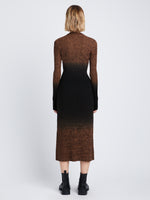 Back full length image of model wearing Gradient Marl Cardigan in BROWN MELANGE / BLACK