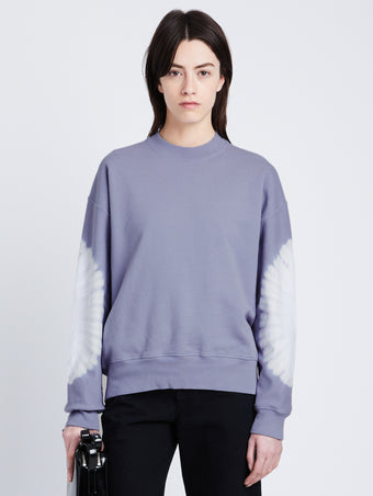 Cropped front image of model in Ring Tie Dye Sweatshirt in Lilac/Off White