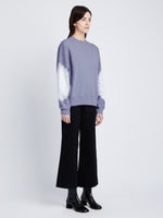 Side image of model in Ring Tie Dye Sweatshirt in Lilac/Off White