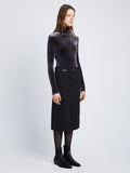 Side full length image of model wearing Sloane Skirt in BLACK