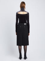 Back full length image of model wearing Sloane Skirt in BLACK
