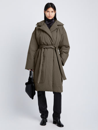 Front full length image of model wearing Technical Suiting Wrap Coat in WOOD