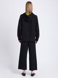 Back image of model wearing Grace Pant In Cotton Cashmere in black/leaf