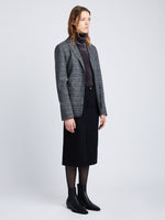 Side full length image of model wearing Plaid Suiting Blazer in BLACK/OFFWHITE/CITRON