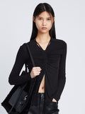 Front cropped image of model wearing Matte Crepe Long Sleeve Top in BLACK