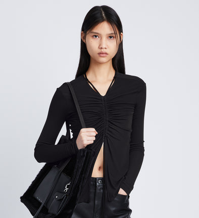 Front cropped image of model wearing Matte Crepe Long Sleeve Top in BLACK