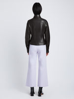 Back full length image of model wearing Sculpted Lightweight Leather Jacket in BLACK