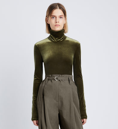 Front cropped image of model wearing Stretch Velvet Turtleneck Top in MILITARY