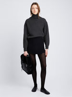 Full front image of model wearing Reversible Cotton Cashmere Sweater in CHARCOAL