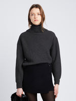 Cropped front image of model wearing Reversible Cotton Cashmere Sweater in CHARCOAL