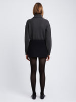 Back image of model wearing Reversible Cotton Cashmere Sweater in CHARCOAL