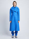 Front image of model wearing Double Face Llama Wool Coat in AZURE with buttons clasped
