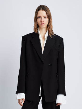 Cropped front image of model wearing Wool Stretch Suiting Jacket in BLACK
