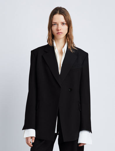 Cropped front image of model wearing Wool Stretch Suiting Jacket in BLACK
