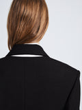 Detail image of model wearing Wool Stretch Suiting Jacket in BLACK