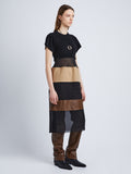 Side full length image of model wearing Multi-Media Dress in BLACK MULTI