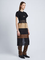 Side full length image of model wearing Multi-Media Dress in BLACK MULTI