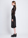 Side full length image of model wearing Technical Chiffon Skirt in BLACK