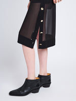 Detail image of model wearing Technical Chiffon Skirt in BLACK