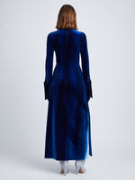 Back full length image of model wearing Ice Dyed Velvet Shirt Dress in COBALT