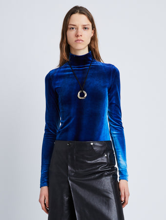 Front cropped image of model wearing Ice Dyed Velvet Top in COBALT