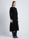 Side full length image of model wearing Wool Viscose Boucle Dress in BLACK