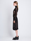 Side full length image of model wearing Viscose Gauze Knit Top in BLACK