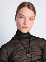 Detail image of model wearing Viscose Gauze Knit Top in BLACK
