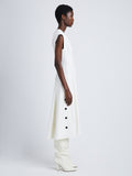 Side full length image of model wearing Matte Viscose Crepe Dress in WHITE