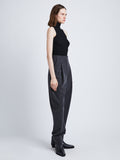 Side full length image of model wearing Matte Viscose Knit Top in BLACK