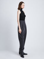 Side full length image of model wearing Matte Viscose Knit Top in BLACK