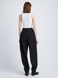Back full length image of model wearing Wool Stretch Suiting Trousers in BLACK